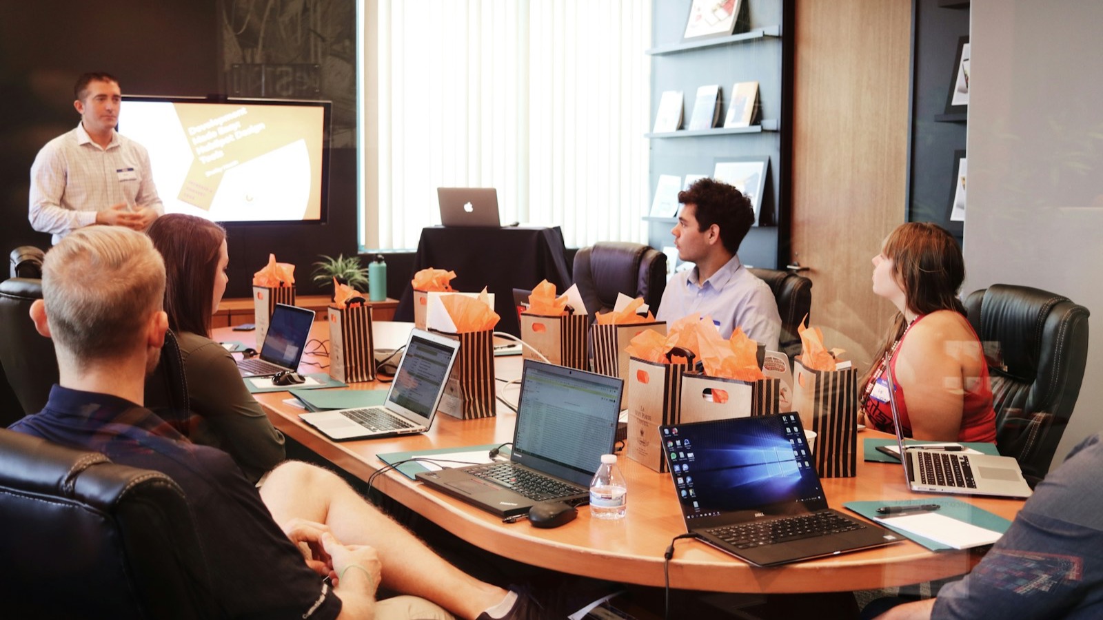 A leadership team reviewing findings together during a briefing